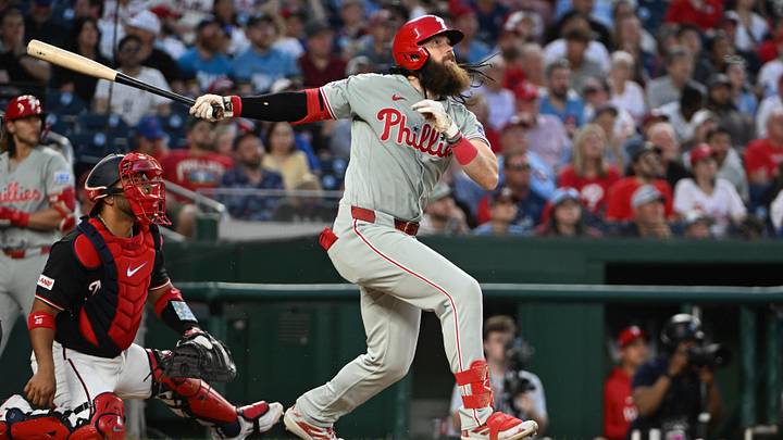 Jun 25, 2026; Washington, District of Columbia, USA; Philadelphia Phillies left fielder Brandon Marsh (16) hits a two run home run against the Washington Nationals during the sixth inning at Nationals Park. Mandatory Credit: Brad Mills-Imagn Images