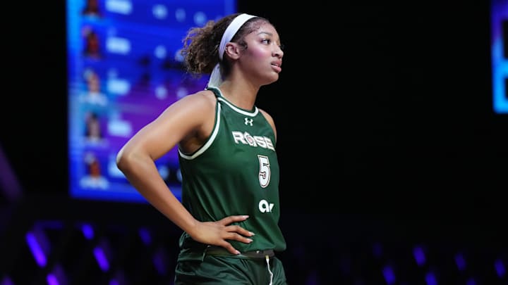 Jan 17, 2025; Miami, FL, USA; Angel Reese (5) of the Rose takes a moment against the Vinyl during a timeout in the first half of the Unrivaled women’s professional 3v3 basketball league at Wayfair Arena. Mandatory Credit: Jim Rassol-Imagn Images Jan 17, 2025; Miami, FL, USA; Angel Reese (5) of the Rose takes a moment against the Vinyl during a timeout in the first half of the Unrivaled women’s professional 3v3 basketball league at Wayfair Arena. Mandatory Credit: Jim Rassol-Imagn Images