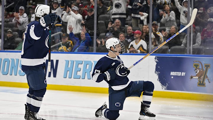 Apr 10, 2025; St. Louis, Missouri, UNITED STATES; Penn State Nittany Lions forward Nicholas DeGraves (17) reacts after scoring against the Boston University Terriers  during the third period of the Frozen Four college ice hockey national semifinals at Enterprise Center. Mandatory Credit: Jeff Curry-Imagn Images
