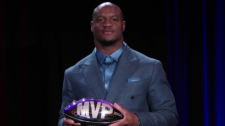 Feb 9, 2026; San Francisco, CA, USA; Seattle Seahawks running back Kenneth Walker III poses with the MVP trophy during the Super Bowl LX winning head coach and most valuable player press conference at Moscone Center. Mandatory Credit: Kirby Lee-Imagn Images Feb 9, 2026; San Francisco, CA, USA; Seattle Seahawks running back Kenneth Walker III poses with the MVP trophy during the Super Bowl LX winning head coach and most valuable player press conference at Moscone Center. Mandatory Credit: Kirby Lee-Imagn Images