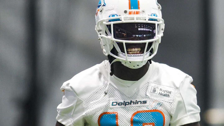 Jun 6, 2023; Miami Gardens, FL, USA; Miami Dolphins wide receiver Tyreek Hill (10) looks on during