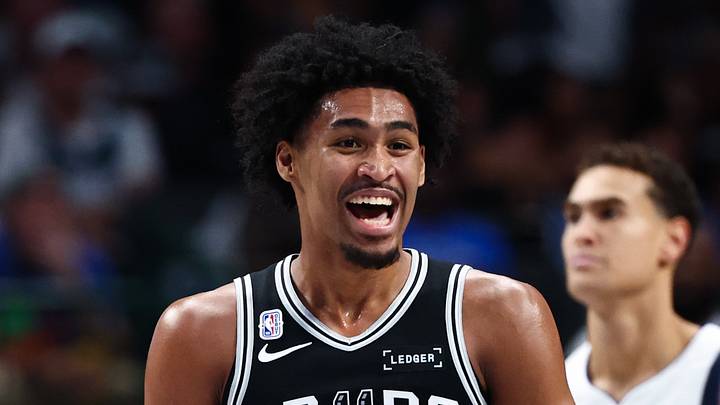 Oct 22, 2025; Dallas, Texas, USA;  San Antonio Spurs guard Dylan Harper (2) reacts during the game against the Dallas Mavericks at American Airlines Center. Mandatory Credit: Kevin Jairaj-Imagn Images