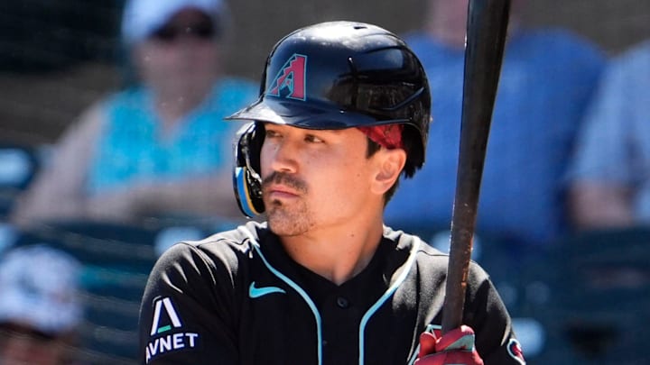 Arizona Diamondbacks Corbin Carroll (7) prepares bat against the Athletics, after a right hand injury during a spring training game in the first inning on March 11, 2026, at Salt River Fields in Scottsdale. Arizona Diamondbacks Corbin Carroll (7) prepares bat against the Athletics, after a right hand injury during a spring training game in the first inning on March 11, 2026, at Salt River Fields in Scottsdale.