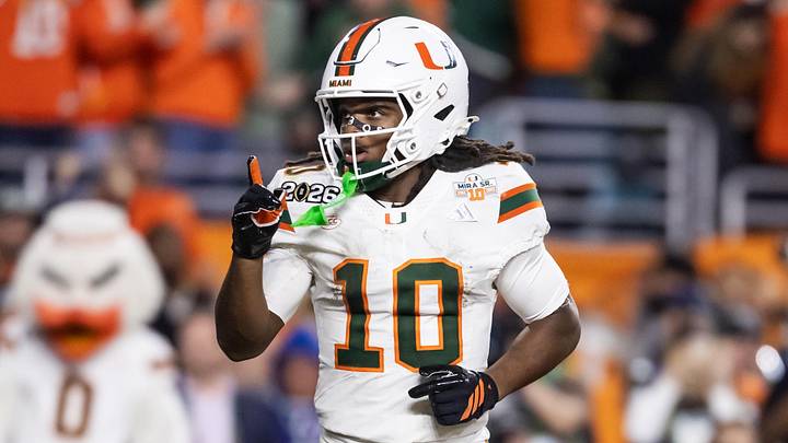 Jan 19, 2026; Miami Gardens, FL, USA; Miami Hurricanes wide receiver Malachi Toney (10) celebrates after scoring a touchdown against the Indiana Hoosiers during the College Football Playoff National Championship game at Hard Rock Stadium. Mandatory Credit: Mark J. Rebilas-Imagn Images