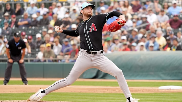 Arizona Diamondbacks starting pitcher Ryne Nelson throws to the Athletics in the first inning during a spring training game at Hohokam Stadium on March 12, 2025, in Mesa.
