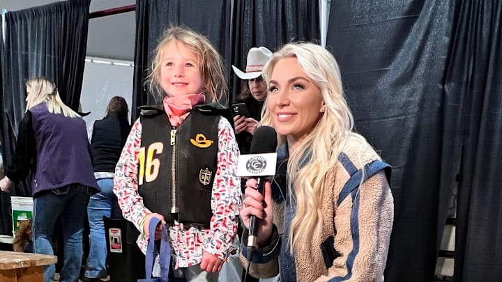 Kirbie Schnoor interviewing young contestant