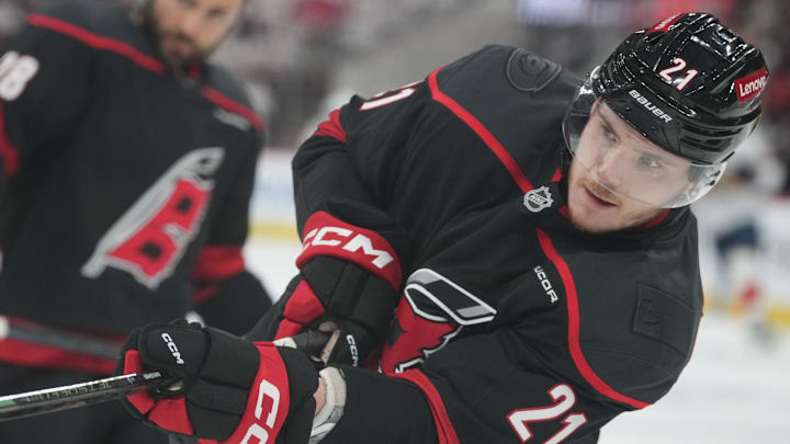May 28, 2025; Raleigh, North Carolina, USA; Carolina Hurricanes defenseman Alexander Nikishin (21) warms up prior to the game against the Florida Panthers in game five of the Eastern Conference Final of the 2025 Stanley Cup Playoffs at Lenovo Center. Mandatory Credit: James Guillory-Imagn Images