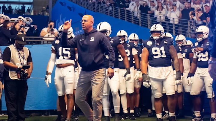 Penn State coach James Franklin leads his players onto the field prior to the game against the Boise State Broncos in the Fiesta Bowl.