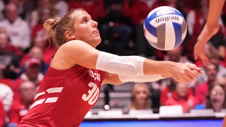 Wisconsin's Lola Schumacher (30) digs a serve during the match against Michigan State on Saturday, November 30, 2024 at the UW Field House in Madison, Wisconsin.