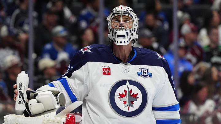 Mar 28, 2026; Denver, Colorado, USA; Winnipeg Jets goaltender Connor Hellebuyck (37) during the second period against the Colorado Avalanche at Ball Arena. Mandatory Credit: Ron Chenoy-Imagn Images