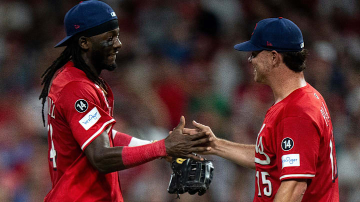 Cincinnati Reds shortstop Elly De La Cruz (44) greets Cincinnati Reds pitcher Emilio Pagán (15) in the ninth inning between Cincinnati Reds and Tampa Bay Rays at Great American Ball Park in Cincinnati on July 26, 2025.