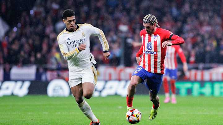 Rodrigo De Paul (R) of Atletico de Madrid and Jude...