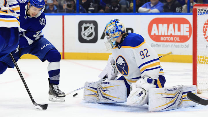 Feb 3, 2026; Tampa, Florida, USA; Tampa Bay Lightning center Yanni Gourde (37) shoots as Buffalo Sabres goaltender Colten Ellis (92) defends during the third period at Benchmark International Arena. Mandatory Credit: Kim Klement Neitzel-Imagn Images