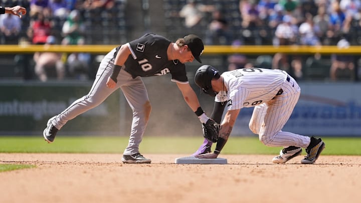 Colorado Rockies pinch hitter Brenton Doyle steals second base against the Chicago White Sox