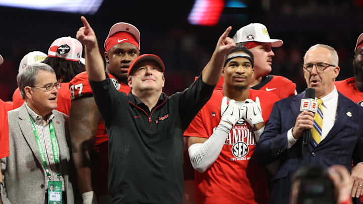 Dec 7, 2024; Atlanta, GA, USA; Georgia Bulldogs head coach Kirby Smart reacts after defeating the Texas Longhorns in overtime in the 2024 SEC Championship game at Mercedes-Benz Stadium. Mandatory Credit: Brett Davis-Imagn Images