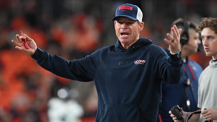 Nov 23, 2024; Syracuse, New York, USA; Connecticut Huskies head coach Jim Mora reacts to a call in the third quarter game against the Syracuse Orange at the JMA Wireless Dome. Mandatory Credit: Mark Konezny-Imagn Images