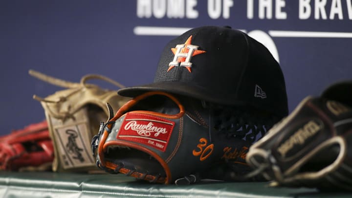 Aug 20, 2022; Atlanta, Georgia, USA; A detailed view of the hat and glove of Houston Astros right fielder Kyle Tucker (not pictured) against the Atlanta Braves in the eleventh inning at Truist Park. Mandatory Credit: Brett Davis-Imagn Images Aug 20, 2022; Atlanta, Georgia, USA; A detailed view of the hat and glove of Houston Astros right fielder Kyle Tucker (not pictured) against the Atlanta Braves in the eleventh inning at Truist Park. Mandatory Credit: Brett Davis-Imagn Images