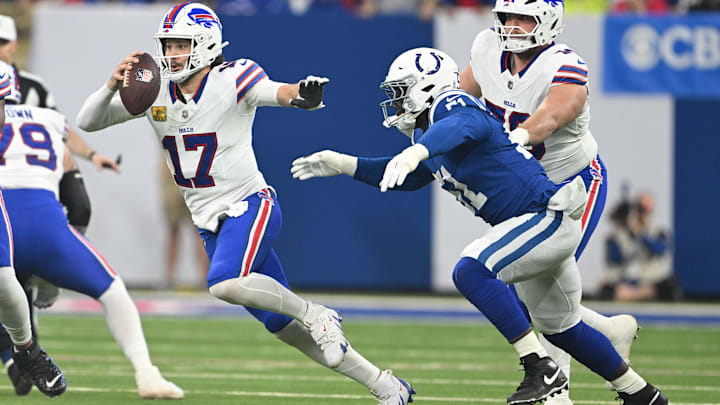 Nov 10, 2024; Indianapolis, Indiana, USA; Buffalo Bills quarterback Josh Allen (17) jukes to avoid Indianapolis Colts defensive end Kwity Paye (51) during the first quarter at Lucas Oil Stadium. Mandatory Credit: Marc Lebryk-Imagn Images Nov 10, 2024; Indianapolis, Indiana, USA; Buffalo Bills quarterback Josh Allen (17) jukes to avoid Indianapolis Colts defensive end Kwity Paye (51) during the first quarter at Lucas Oil Stadium. Mandatory Credit: Marc Lebryk-Imagn Images