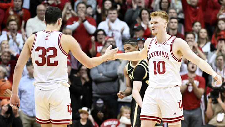 Indiana's Trey Galloway (32) and Luke Goode (10) celebrate against Purdue at Simon Skjodt Assembly Hall. 