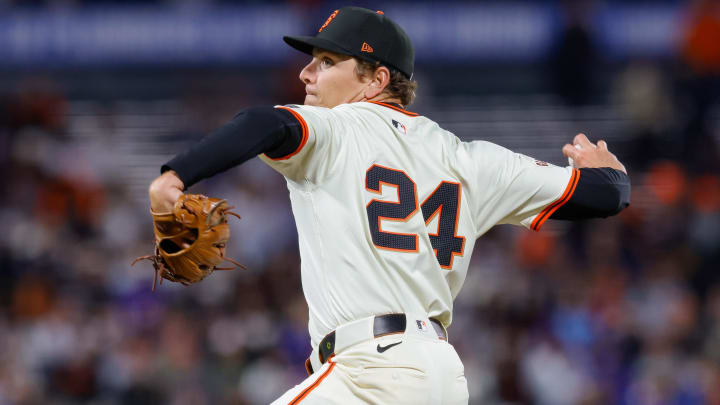 Jun 24, 2024; San Francisco, California, USA; San Francisco Giants pitcher Spencer Howard throws a pitch during the ninth inning against the Chicago Cubs at Oracle Park. All Giants players wore the number 24 in honor of Giants former player Willie Mays. Mandatory Credit: Sergio Estrada-USA TODAY Sports
