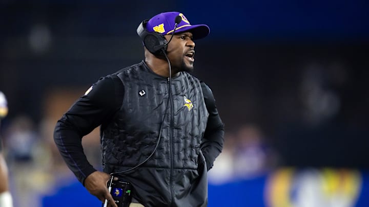 Jan 13, 2025; Glendale, AZ, USA; Minnesota Vikings defensive coordinator Brian Flores against the Los Angeles Rams during an NFC wild card game at State Farm Stadium. Mandatory Credit: Mark J. Rebilas-Imagn Images