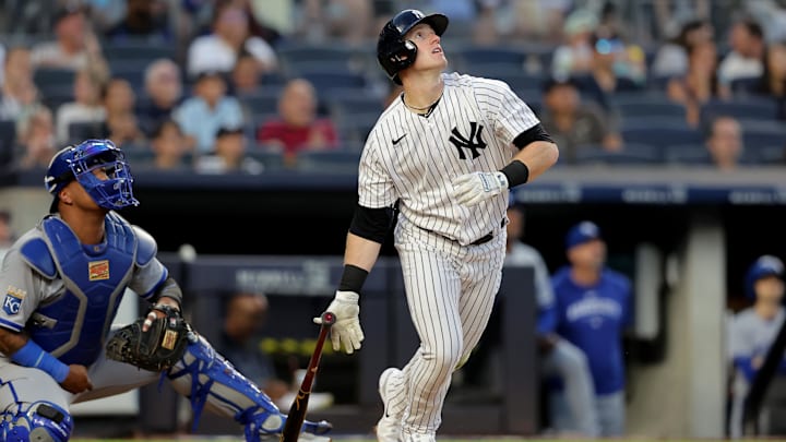 Jul 21, 2023; Bronx, New York, USA; New York Yankees center fielder Billy McKinney (57) follows through on a three run home run against the Kansas City Royals during the fourth inning at Yankee Stadium. Mandatory Credit: Brad Penner-Imagn Images