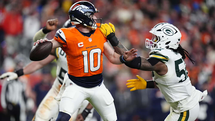Dec 14, 2025; Denver, Colorado, USA; Denver Broncos quarterback Bo Nix (10) attempts to throw downfield under pressure from Green Bay Packers defensive end Rashan Gary (52) during the fourth quarter at Empower Field at Mile High. Mandatory Credit: Ron Chenoy-Imagn Images Dec 14, 2025; Denver, Colorado, USA; Denver Broncos quarterback Bo Nix (10) attempts to throw downfield under pressure from Green Bay Packers defensive end Rashan Gary (52) during the fourth quarter at Empower Field at Mile High. Mandatory Credit: Ron Chenoy-Imagn Images