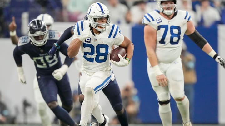 Indianapolis Colts running back Jonathan Taylor (28) rushes for a touchdown Sunday, Dec. 22, 2024, during a game against the Tennessee Titans at Lucas Oil Stadium in Indianapolis.