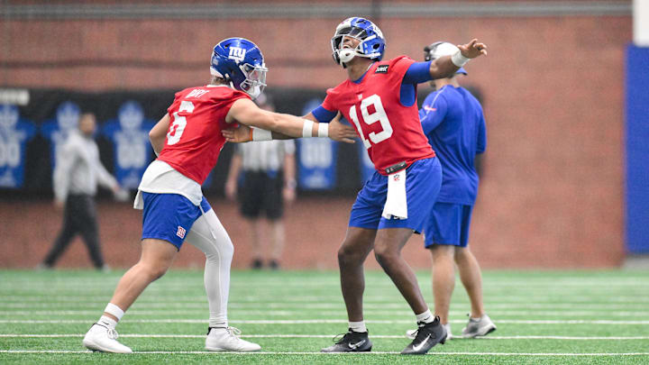 New York Giants quarterback Jaxson Dart (6) and quarterback Jameis Winston (19) interact during a practice.