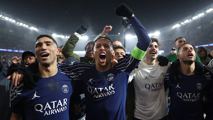 PSG players celebrating their victory against Manchester City with their fans at the Parc des Princes