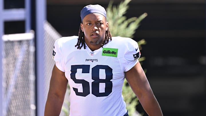 Jul 28, 2025; Foxborough, MA, USA; New England Patriots center Jared Wilson (58) heads to the practice fields for training camp at Gillette Stadium. Mandatory Credit: Eric Canha-Imagn Images