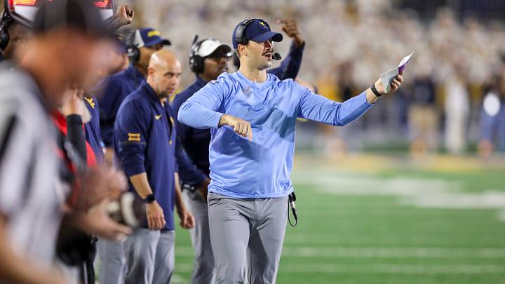Sep 26, 2026; Morgantown, West Virginia, USA; West Virginia Mountaineers defensive coordinator Zac Alley calls out a play during the third quarter against the Oklahoma State Cowboys at Milan Puskar Stadium. Mandatory Credit: Ben Queen-Imagn Images Sep 26, 2026; Morgantown, West Virginia, USA; West Virginia Mountaineers defensive coordinator Zac Alley calls out a play during the third quarter against the Oklahoma State Cowboys at Milan Puskar Stadium. Mandatory Credit: Ben Queen-Imagn Images
