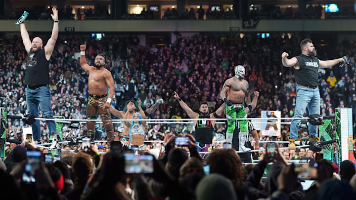 Apr 6, 2024; Philadelphia, PA, USA; Philadelphia Eagles players Lane Johnson (left) and Jason Kelce