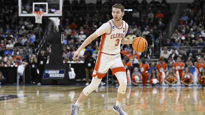 Mar 20, 2025; Providence, RI, USA; Clemson Tigers guard Jake Heidbreder (3) controls the ball against the McNeese State Cowboys during the first half at Amica Mutual Pavilion. Mandatory Credit: Eric Canha-Imagn Images