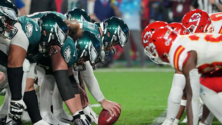 Feb 12, 2023; Glendale, Arizona, US; The Philadelphia Eagles and Kansas City Chiefs line up at the line of scrimmage during the third quarter of Super Bowl LVII at State Farm Stadium. Mandatory Credit: Kirby Lee-Imagn Images