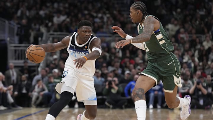 Apr 8, 2025; Milwaukee, Wisconsin, USA; Milwaukee Bucks guard Gary Trent Jr. (5) drives against Milwaukee Bucks guard Kevin Porter Jr. (3) in the first half at Fiserv Forum.
