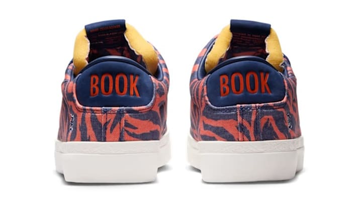 The Devin Booker x Nike Blazer Low 'Safety Orange and Blue Void' colorway.