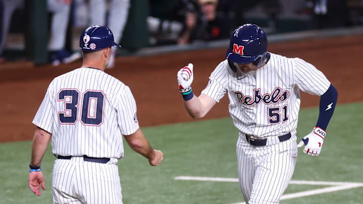 Ole Miss outfielder Isaac Humphrey rounds the bases after hitting a solo home run in a 2-1 win over the Arizona Wildcats at Globe Life Field in Arlington, Texas.