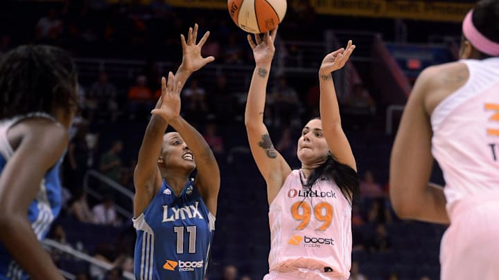 Sep. 21, 2012; Phoenix, AZ, USA; Phoenix Mercury guard Samantha Prahalis (99) puts up a shot against the Minnesota Lynx guard Candice Wiggins (11) in the first half at US Airways Center. Mandatory Credit: Jennifer Stewart-Imagn Images