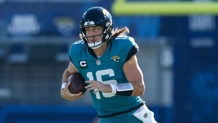 Dec 1, 2024; Jacksonville, Florida, USA; Jacksonville Jaguars quarterback Trevor Lawrence (16) runs with the ball against the Houston Texans in the second quarter at EverBank Stadium. Mandatory Credit: Nathan Ray Seebeck-Imagn Images