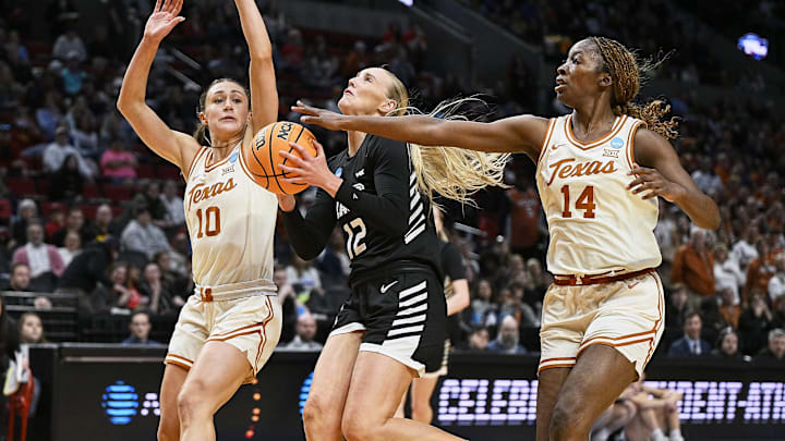 Mar 29, 2024; Portland, OR, USA; Texas Longhorns forward Amina Muhammad (14) fouls Gonzaga Bulldogs