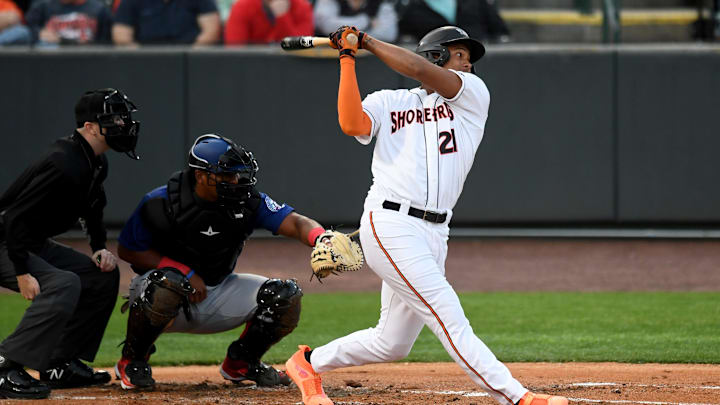 Shorebirds' Samuel Basallo (21) swings in the game against the Cannon Ballers Tuesday, April 11, 2023, at Perdue Stadium in Salisbury, Maryland. The Shorebirds defeated the Cannon Ballers 7-2.