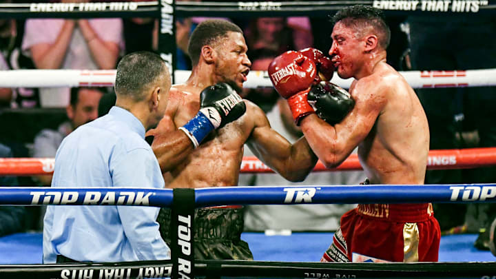 Brian Norman Jr. lands a left uppercut on Giovani Santillan in their WBO interim welterweight title bout. Brian Norman Jr. lands a left uppercut on Giovani Santillan in their WBO interim welterweight title bout.