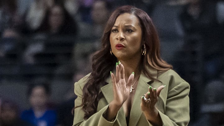 Mar 29, 2025; Birmingham, AL, USA; Notre Dame Fighting Irish head coach Niele Ivey cheers her team during the first half of a Sweet 16 NCAA Tournament basketball game against the TCU Horned Frogs at Legacy Arena. Mandatory Credit: Vasha Hunt-Imagn Images
