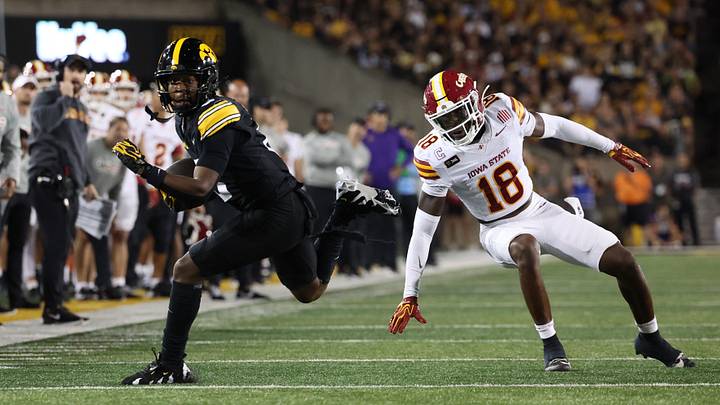 Sep 12, 2026; Iowa City, Iowa, USA; Iowa Hawkeyes wide receiver Evan James (8) makes the catch in front of Iowa State Cyclones cornerback David Coffey (18) during the fourth quarter at Kinnick Stadium. Mandatory Credit: Reese Strickland-Imagn Images Sep 12, 2026; Iowa City, Iowa, USA; Iowa Hawkeyes wide receiver Evan James (8) makes the catch in front of Iowa State Cyclones cornerback David Coffey (18) during the fourth quarter at Kinnick Stadium. Mandatory Credit: Reese Strickland-Imagn Images