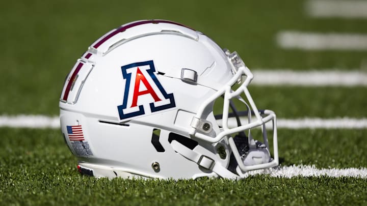 Nov 25, 2022; Tucson, Arizona, USA; Detailed view of an Arizona Wildcats helmet on the field during the Territorial Cup at Arizona Stadium. Mandatory Credit: Mark J. Rebilas-Imagn Images