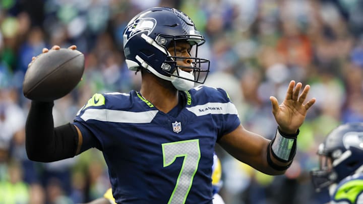 Nov 3, 2024; Seattle, Washington, USA; Seattle Seahawks quarterback Geno Smith (7) passes against the Los Angeles Rams during the second quarter at Lumen Field. Mandatory Credit: Joe Nicholson-Imagn Images Nov 3, 2024; Seattle, Washington, USA; Seattle Seahawks quarterback Geno Smith (7) passes against the Los Angeles Rams during the second quarter at Lumen Field. Mandatory Credit: Joe Nicholson-Imagn Images