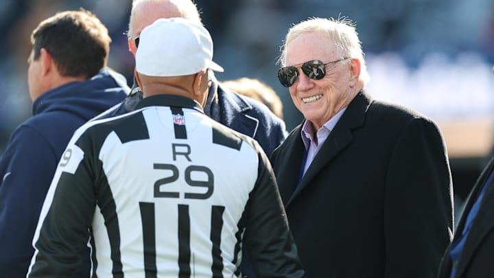 Dallas Cowboys owner Jerry Jones speaks with referee Adrian Hill before a game against the New York Giants at MetLife Stadium. Dallas Cowboys owner Jerry Jones speaks with referee Adrian Hill before a game against the New York Giants at MetLife Stadium.