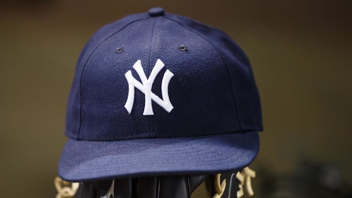 May 18, 2016; Phoenix, AZ, USA; Detailed view of a New York Yankees hat and baseball glove against the Arizona Diamondbacks at Chase Field. Mandatory Credit: Mark J. Rebilas-Imagn Images May 18, 2016; Phoenix, AZ, USA; Detailed view of a New York Yankees hat and baseball glove against the Arizona Diamondbacks at Chase Field. Mandatory Credit: Mark J. Rebilas-Imagn Images