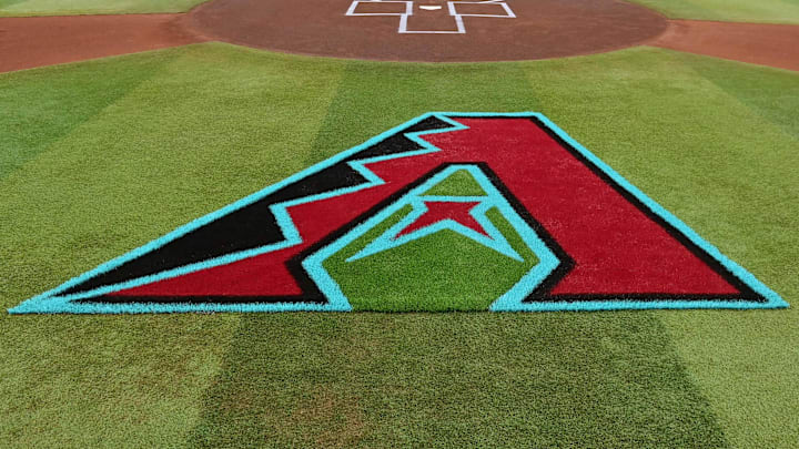 Apr 16, 2024; Phoenix, Arizona, USA; General view of the Arizona Diamondbacks logo on the field prior to the game against the Chicago Cubs at Chase Field. Mandatory Credit: Matt Kartozian-Imagn Images Apr 16, 2024; Phoenix, Arizona, USA; General view of the Arizona Diamondbacks logo on the field prior to the game against the Chicago Cubs at Chase Field. Mandatory Credit: Matt Kartozian-Imagn Images
